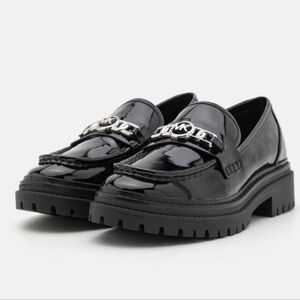 Micheal Kors Calista Lug Loafers In Black Patent